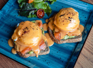 Eggs Benedict with Salmon & Hollandaise Sauce Paddock Restaurant The Pavilion Al Furjan